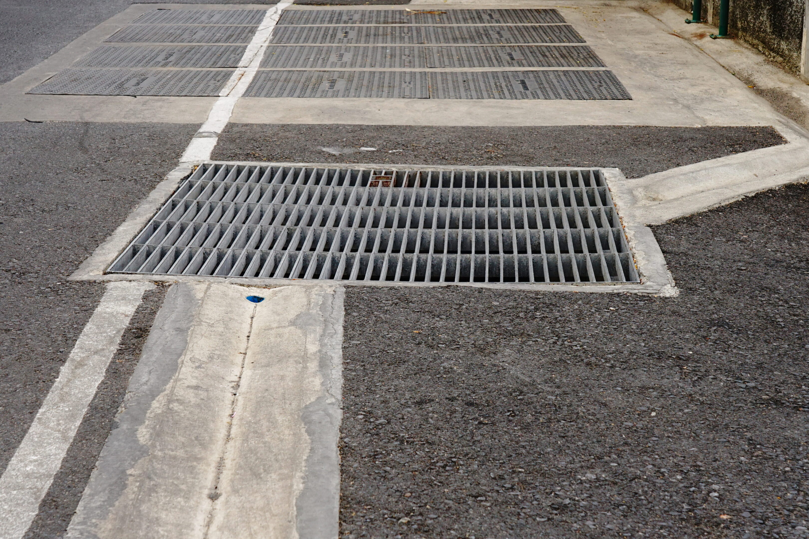 Close up of a sidewalk drainage